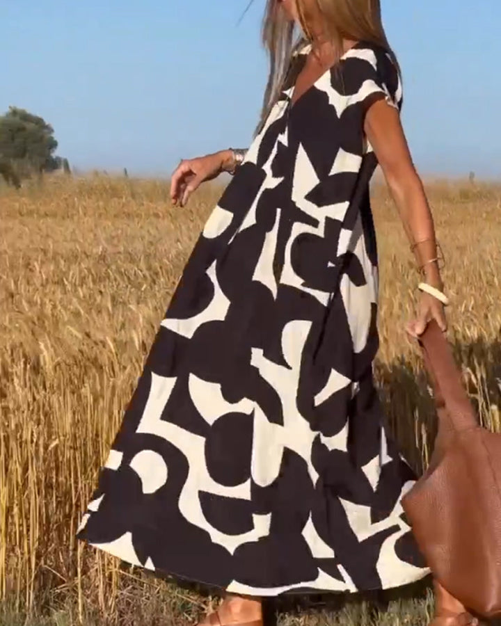 Sita - Summer Dress with print and V-neckline