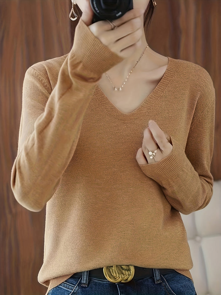 Camille relaxed V-neck sweater in camel, front view with jeans