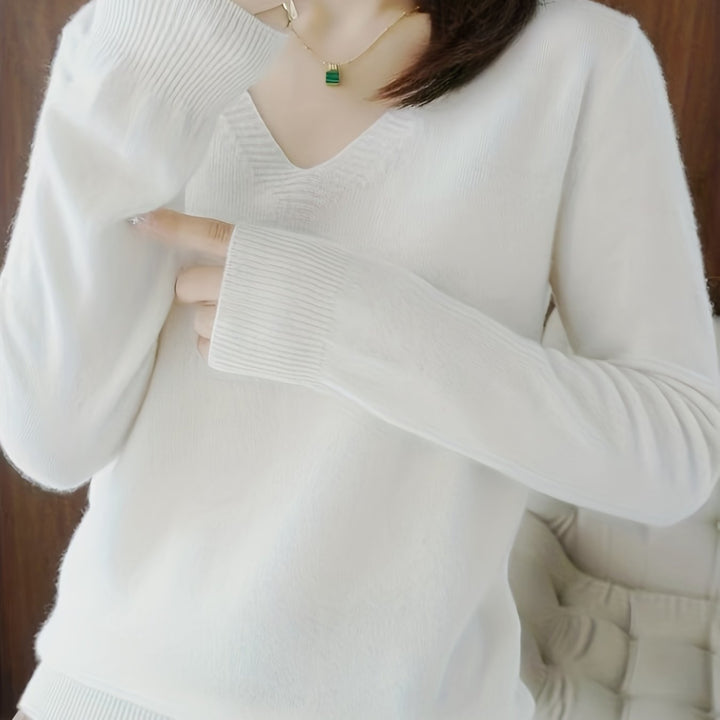 Camille relaxed V-neck sweater in white, close-up cuff detail