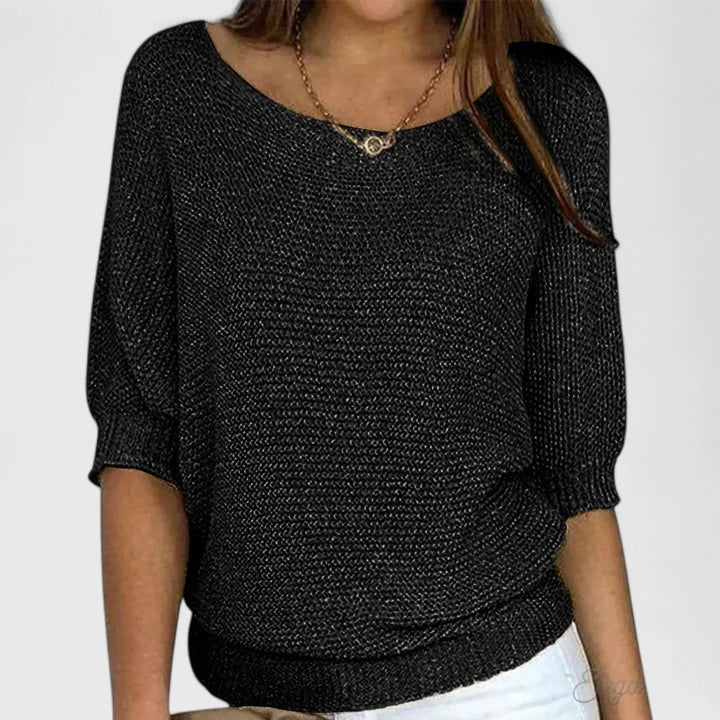 Delphine relaxed batwing knit sweater in black, front view