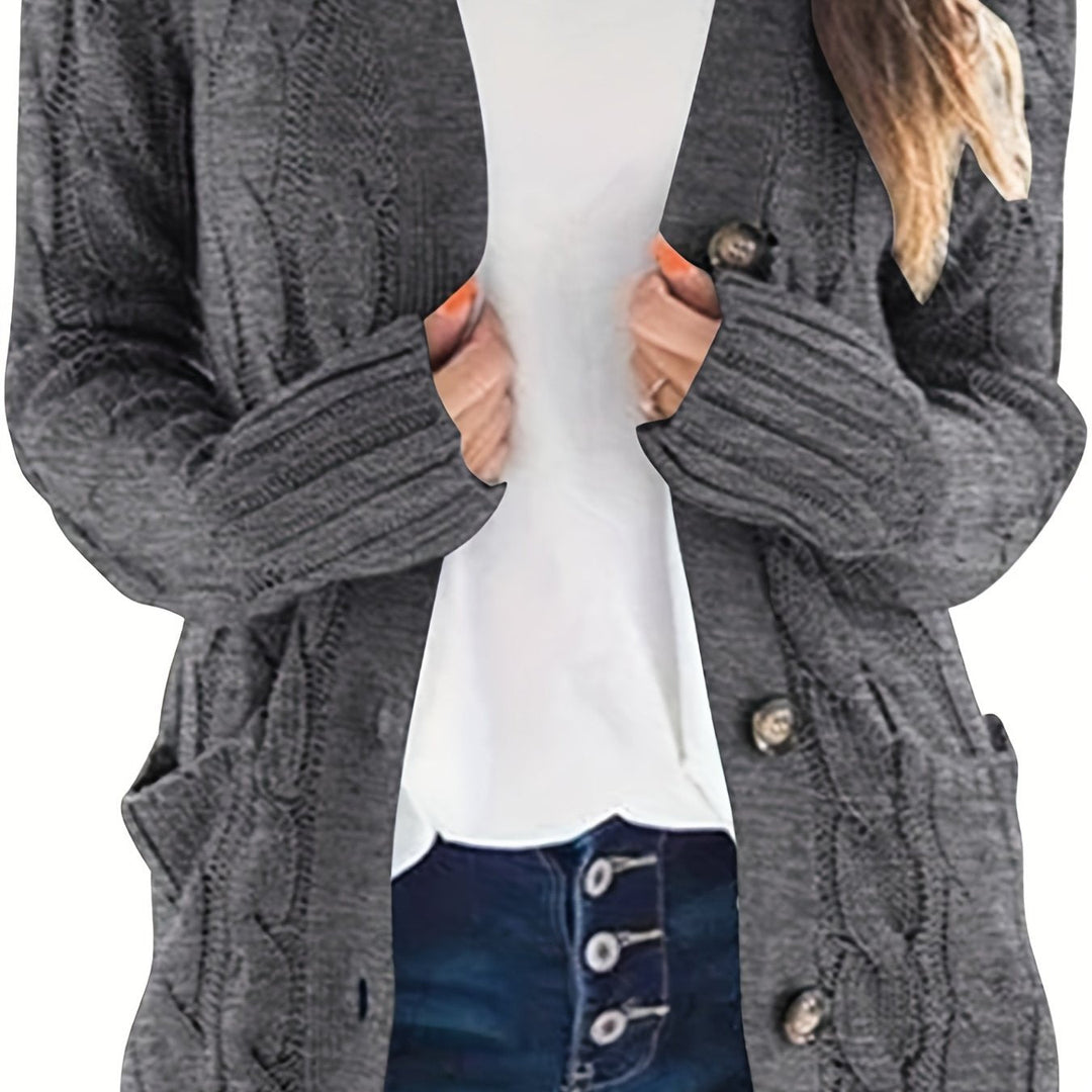 Delphine cable knit cardigan in dark gray, close-up on buttons and cuffs