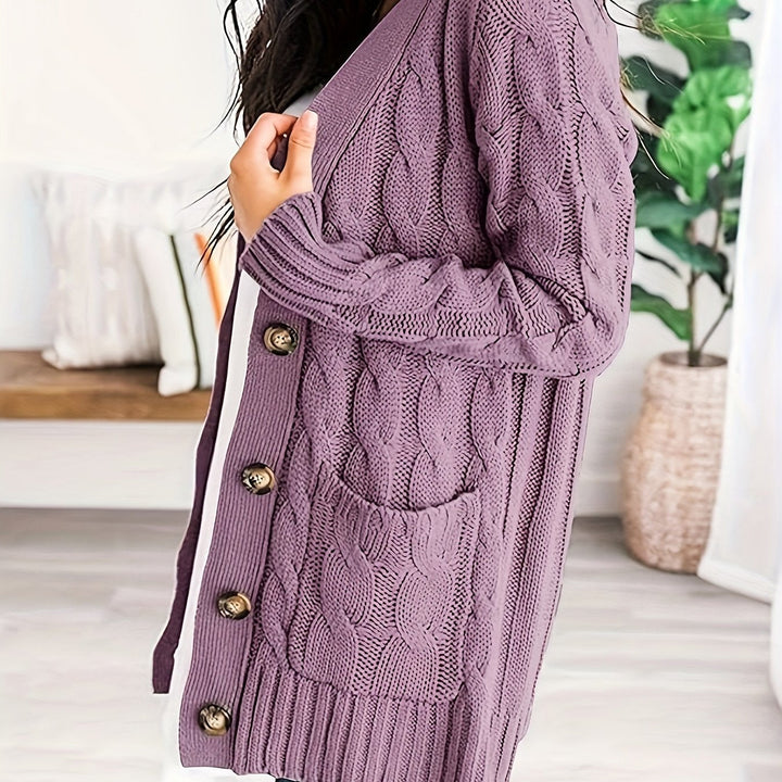 Delphine cable knit cardigan in purple, side view showing texture and pocket detail