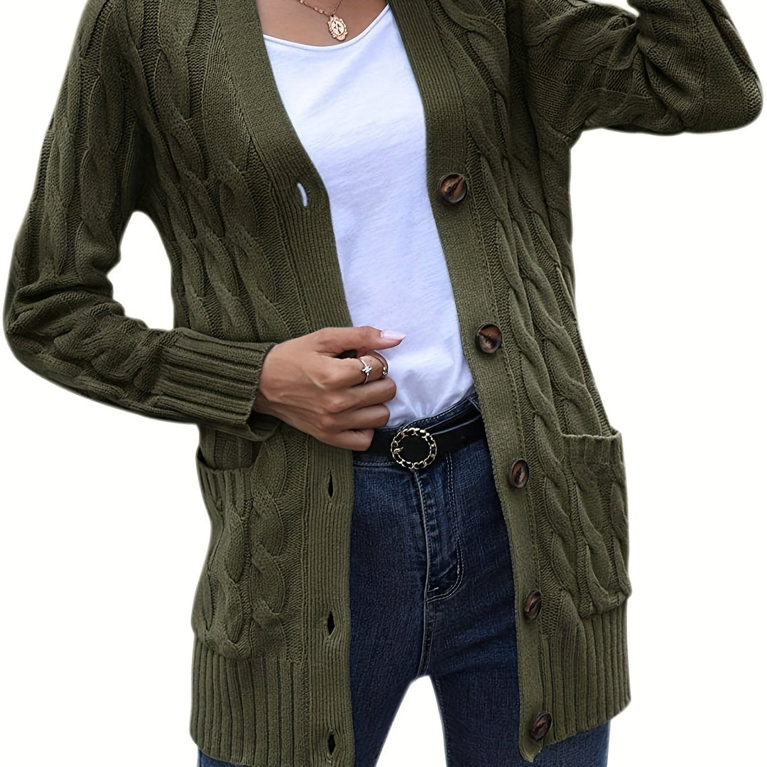 Delphine cable knit cardigan in army green, front view with belt and jeans
