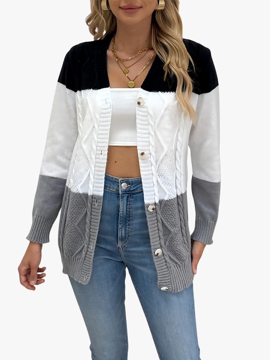 Delphine colorblock cable knit cardigan, close-up front view on model