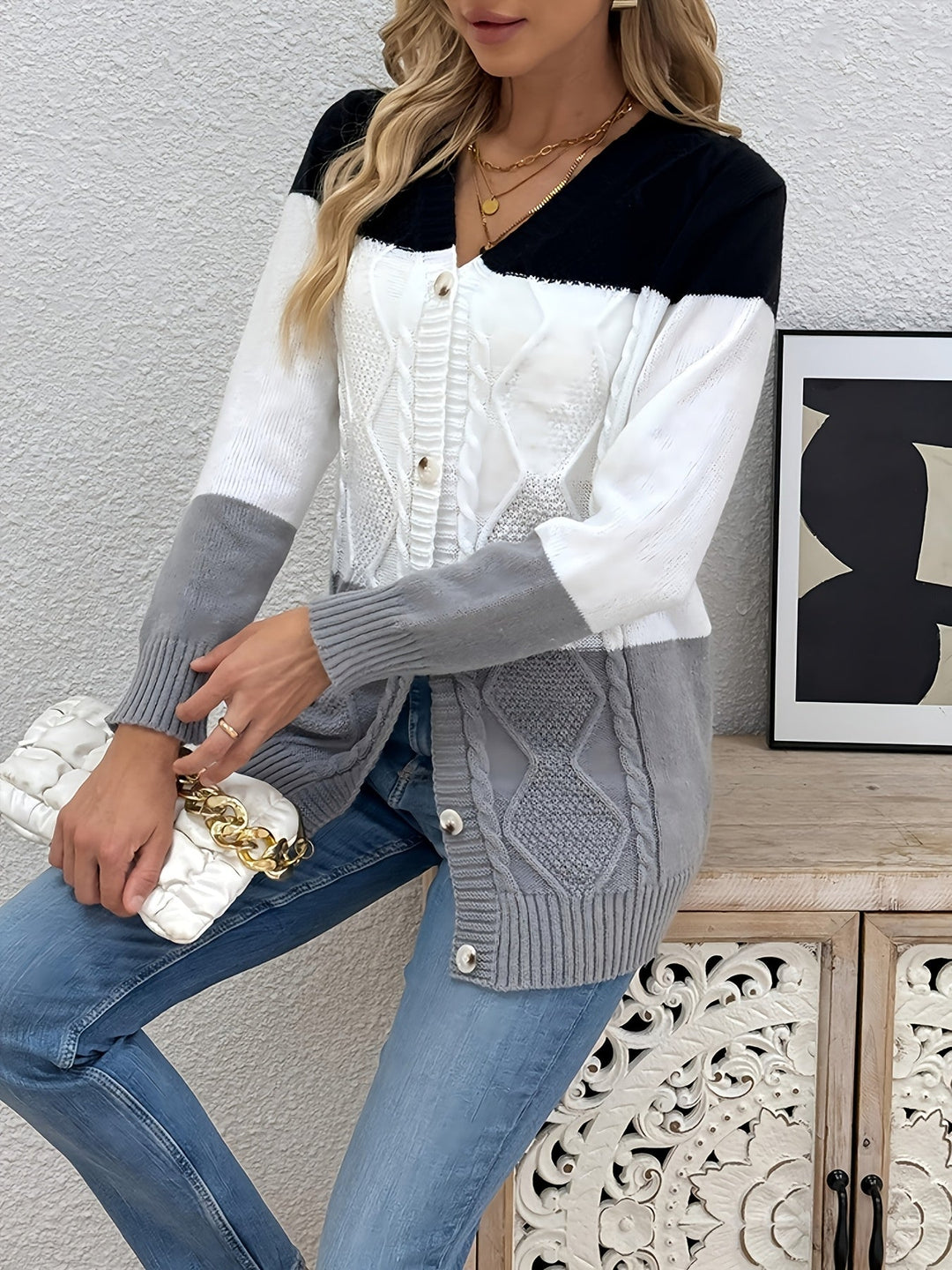 Delphine colorblock cable knit cardigan, front view with accessories