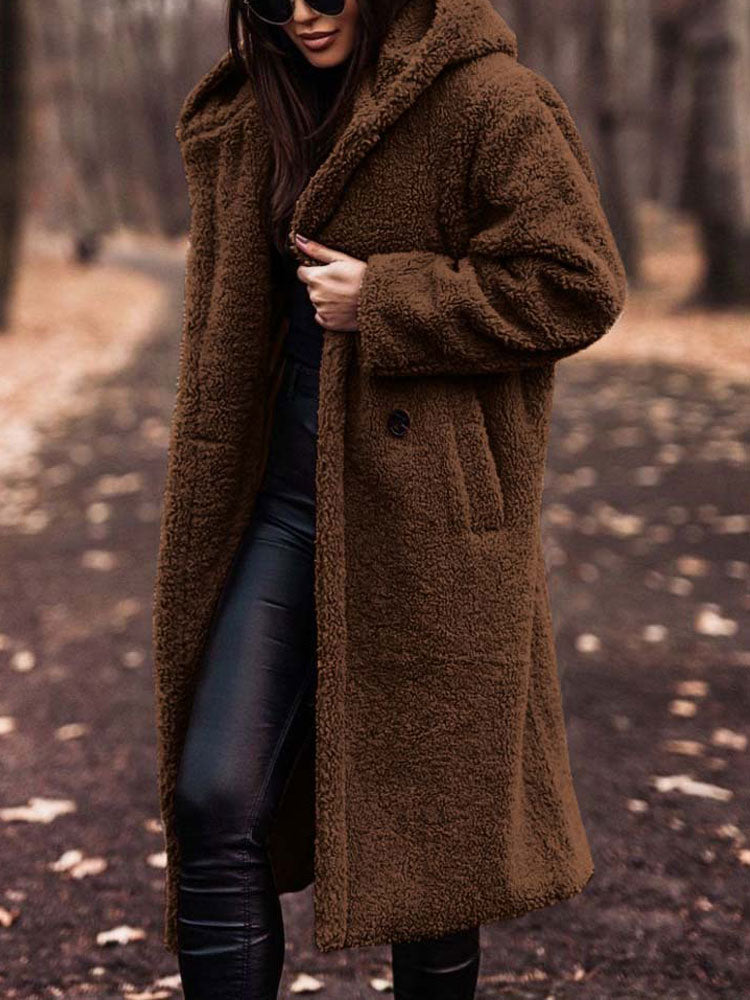 Delphine brown hooded teddy coat, front view with hands in pockets