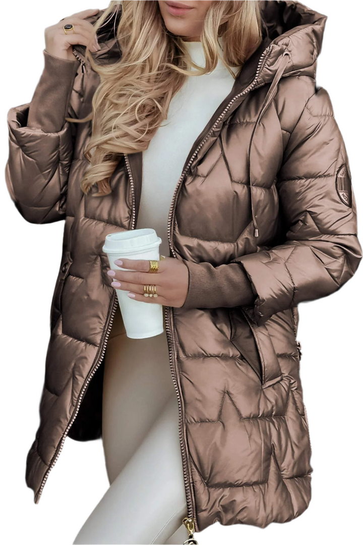 Eleanor hooded quilted puffer coat in gray, front view with coffee cup