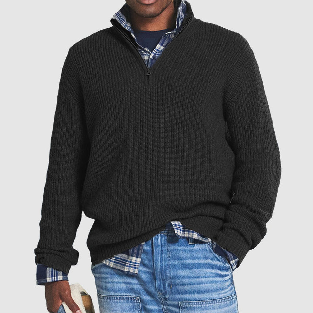Emmett ribbed quarter-zip knit sweater in black, front view layered over plaid shirt