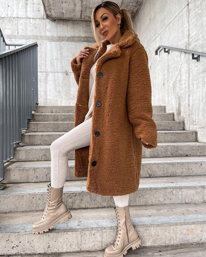 Everly plush teddy coat with lapel collar, front view on stairs