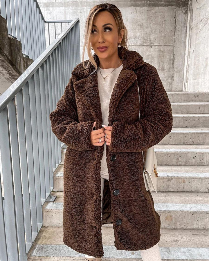 Everly dark brown teddy coat front view with crossbody bag