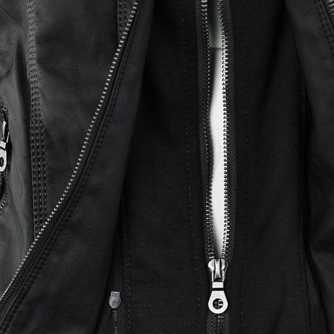 Close-up of front zipper and hood lining on Giselle black faux leather jacket