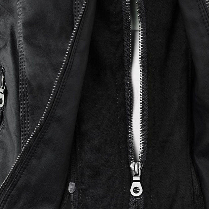 Close-up of front zipper and hood lining on Giselle black faux leather jacket