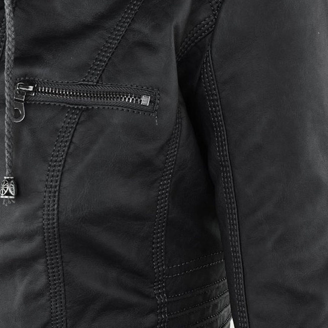 Close-up of zip pocket detail on Giselle black faux leather jacket