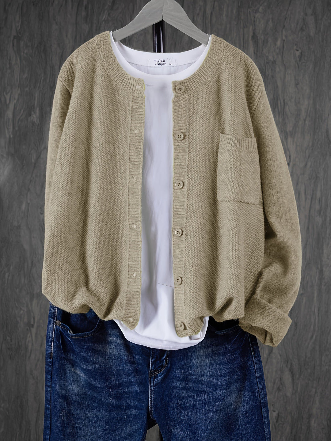 Harlow relaxed button-front cardigan in light brown, front view on hanger