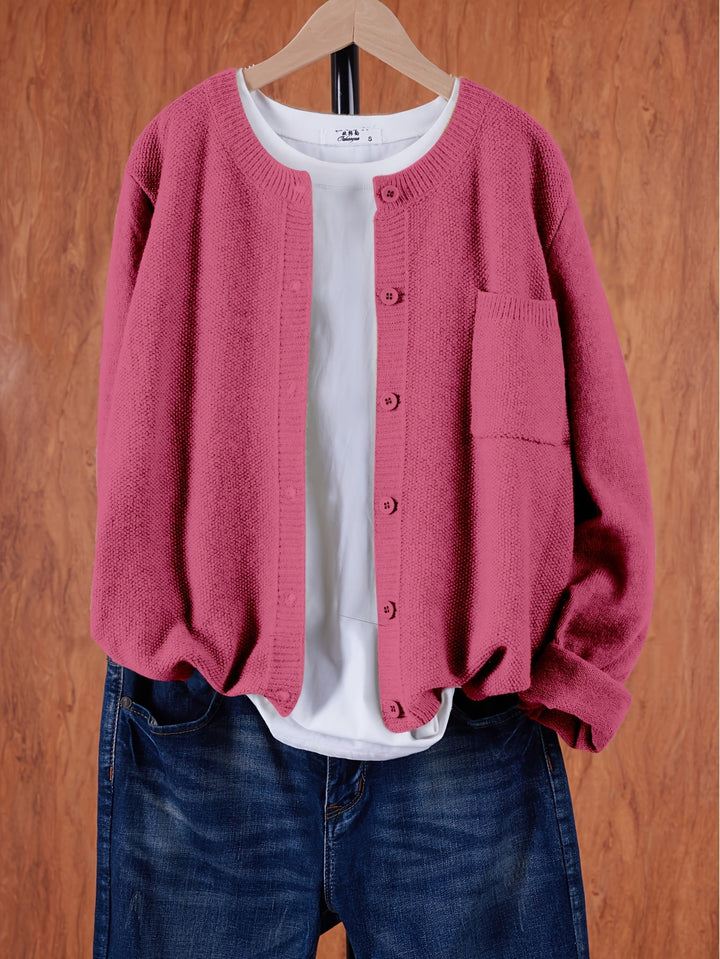 Harlow relaxed button-front cardigan in dark pink, front view on hanger