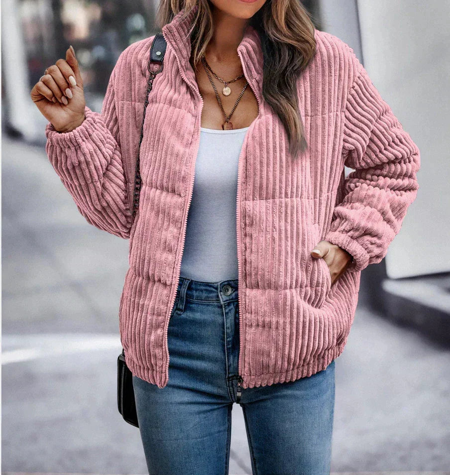 Harlow ribbed puffer jacket in pink, front view with hand raised