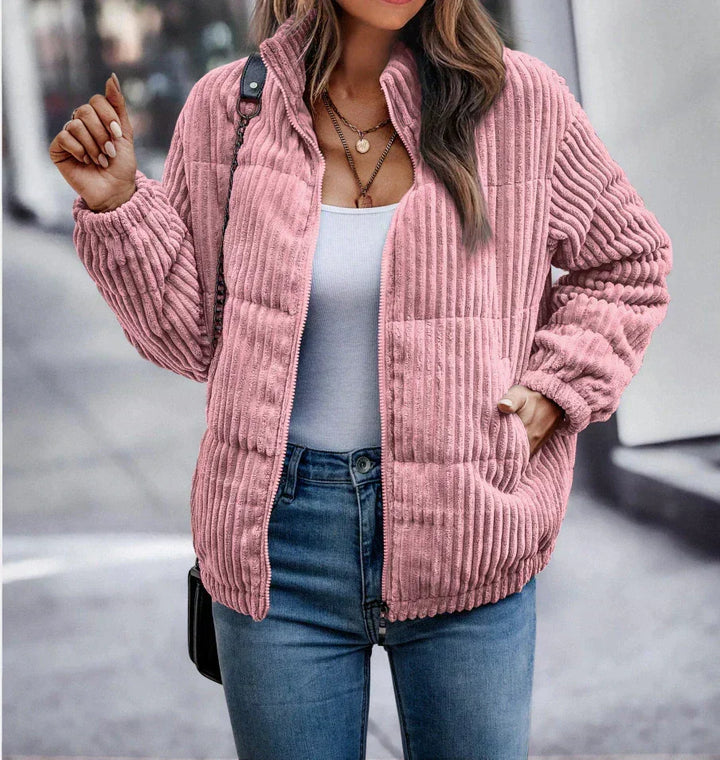 Harlow ribbed puffer jacket in pink, front view with hand raised