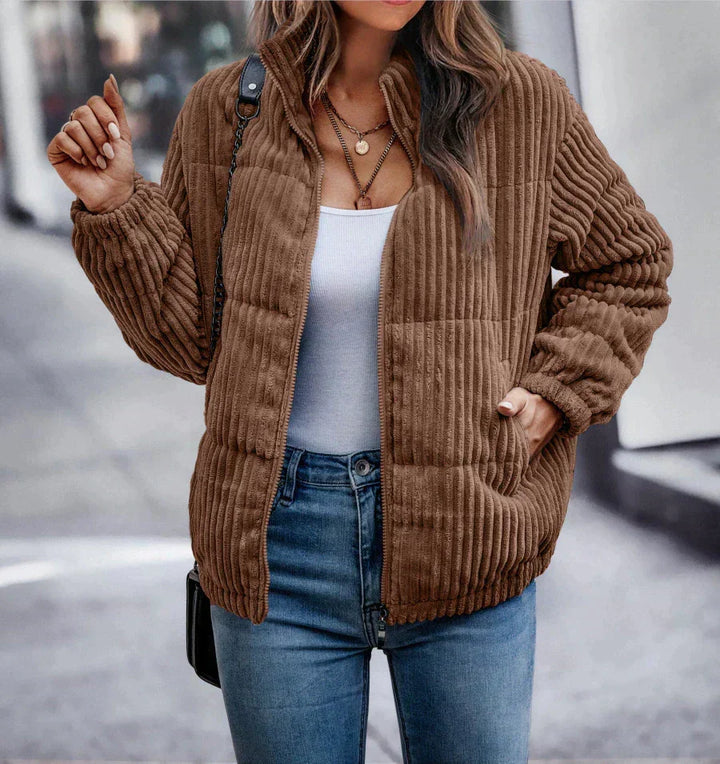 Harlow ribbed puffer jacket in brown, front view with hand in pocket