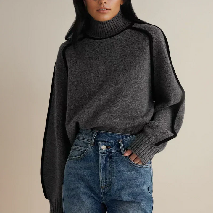 Isolde gray turtleneck sweater with contrast trim, front view with jeans