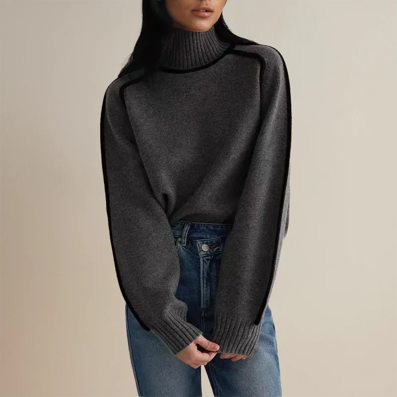 Isolde gray turtleneck sweater with contrast piping, front view with jeans