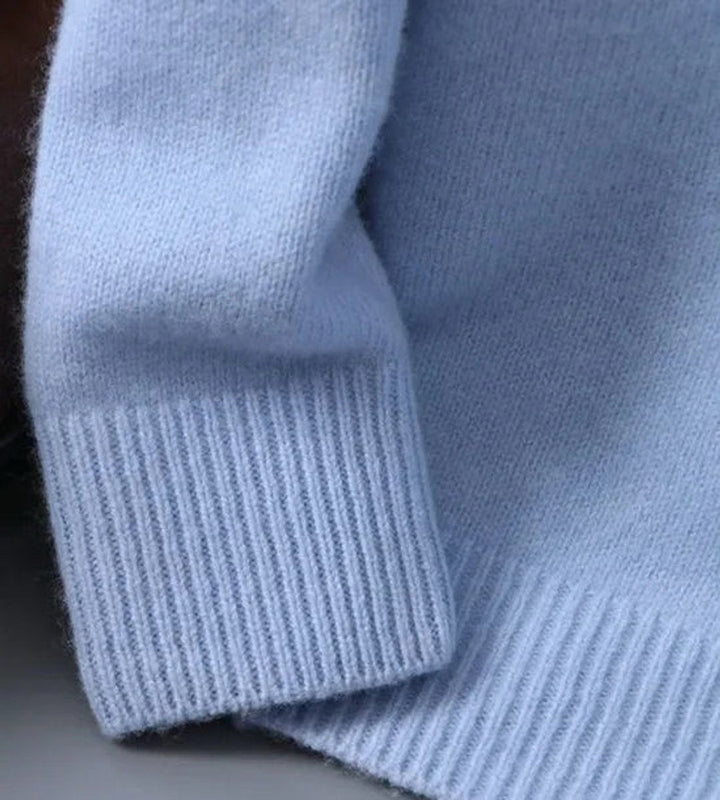 Close-up of ribbed cuff and sleeve on Leonard knit sweater