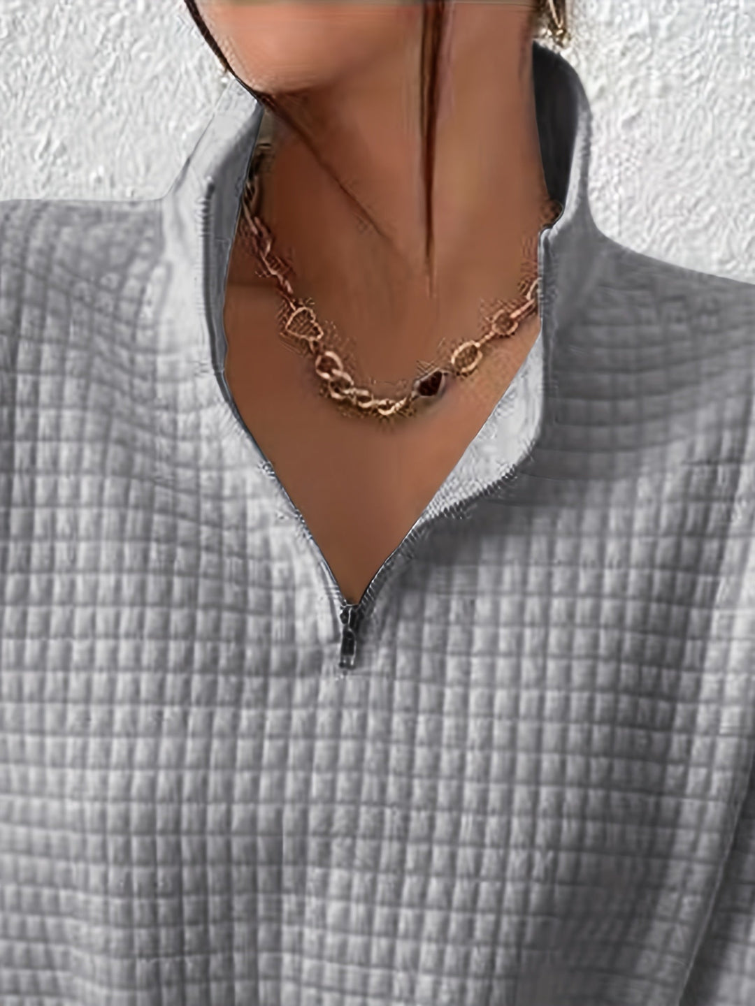 Marguerite grey textured quarter-zip pullover, close-up of collar and zip