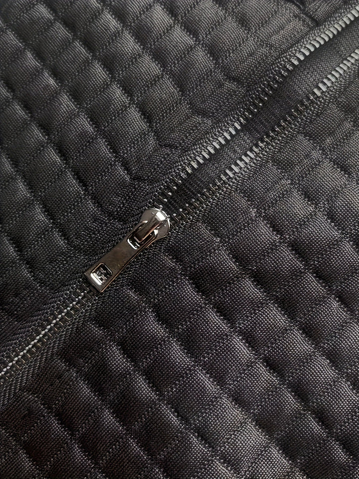 Marguerite black textured knit fabric with zipper close-up