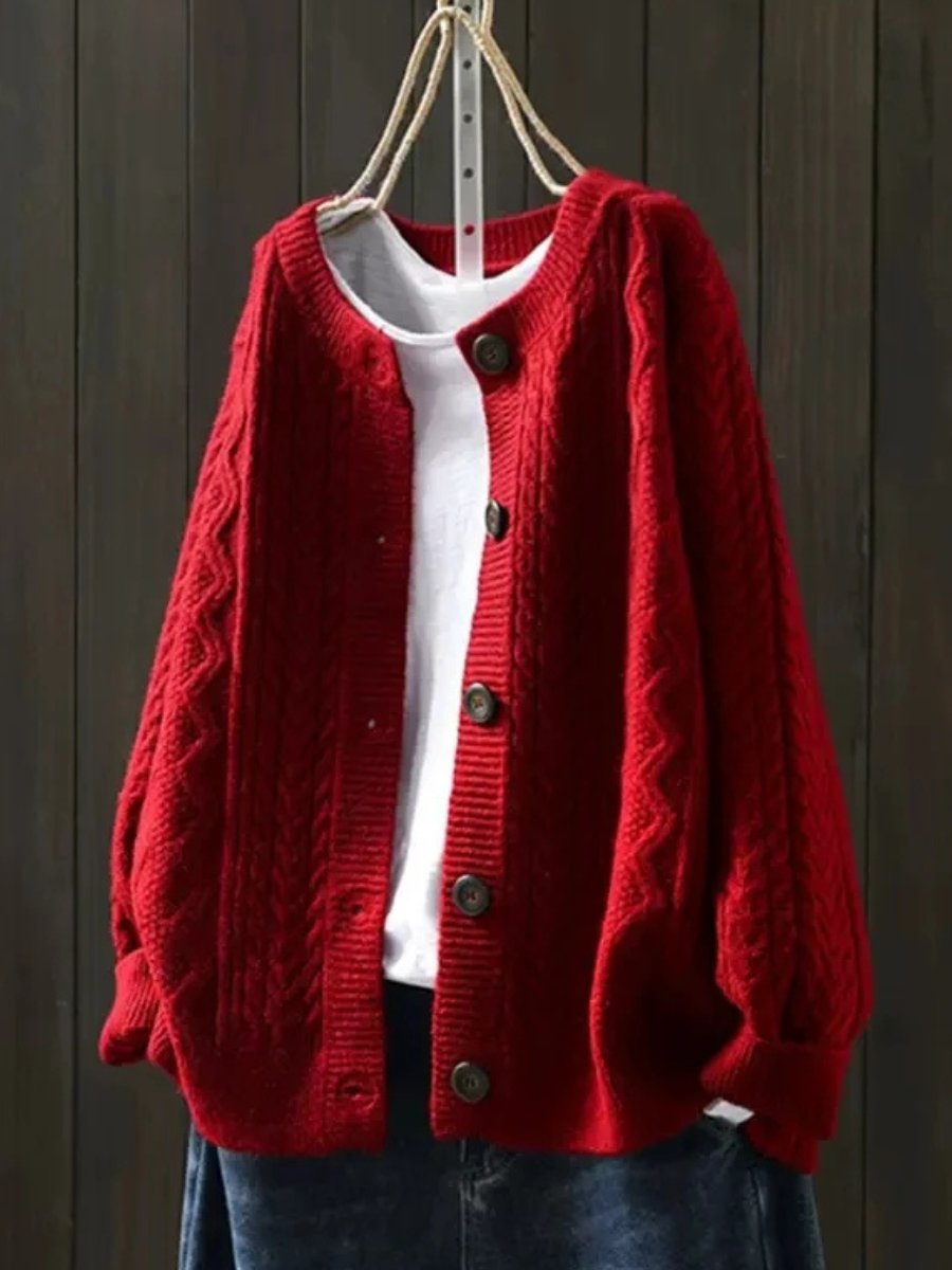 Marielle oversized cable knit button cardigan in red, front view on hanger