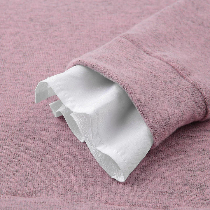Marigold sweater ribbed cuff detail close-up in pink