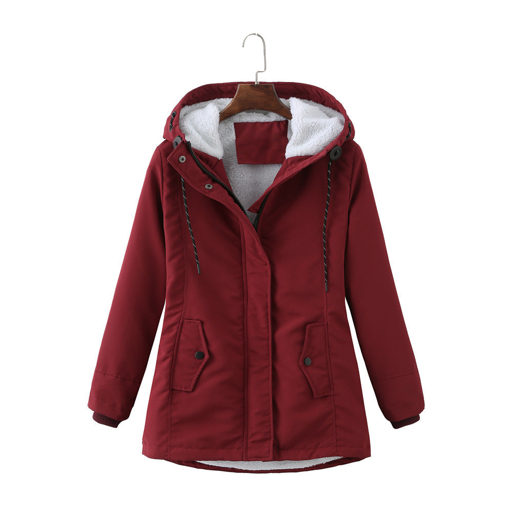 Marina hooded winter parka jacket in mint green, front view on hanger