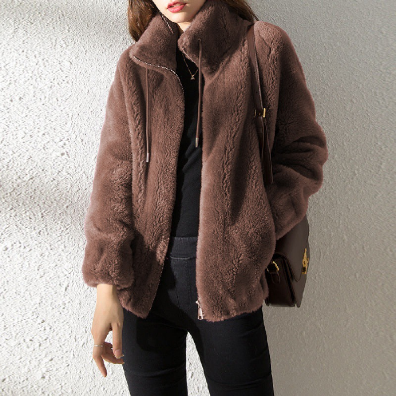 Marina teddy coat in brown, worn with black jeans and shoulder bag
