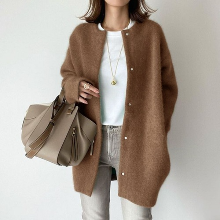 Marlowe fuzzy button down cardigan in brown, front view with handbag