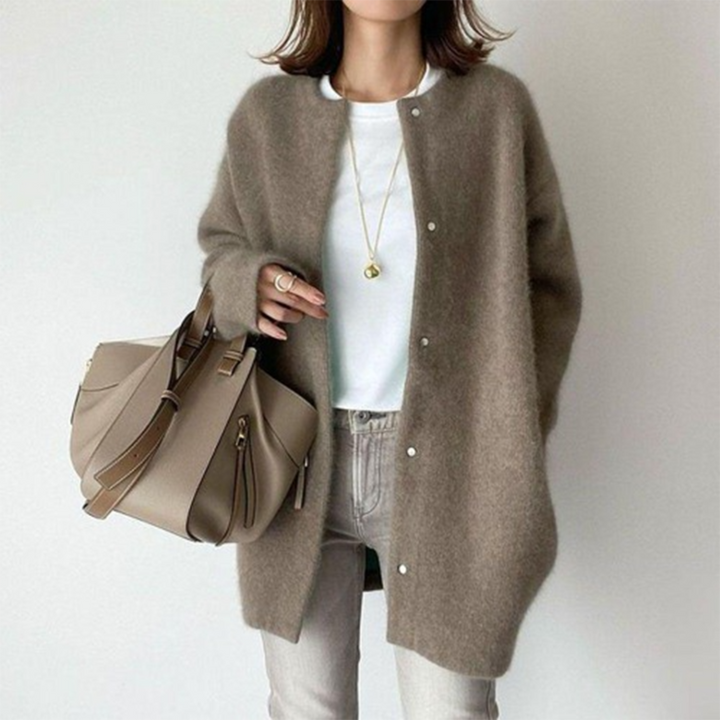 Marlowe fuzzy button down cardigan in taupe, front view with handbag