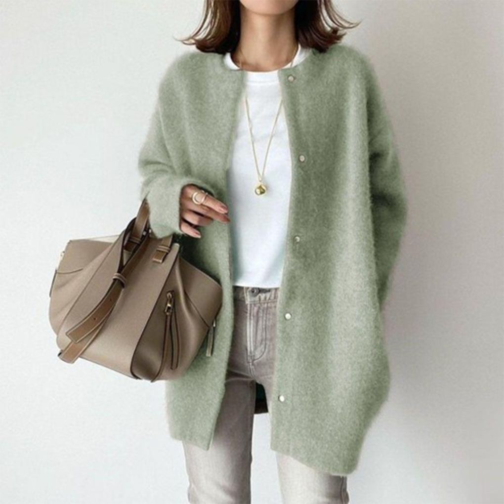 Marlowe fuzzy button down cardigan in sage green, front view with handbag