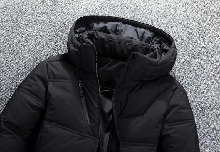 Hudson black winter jacket hood and collar detail, close-up