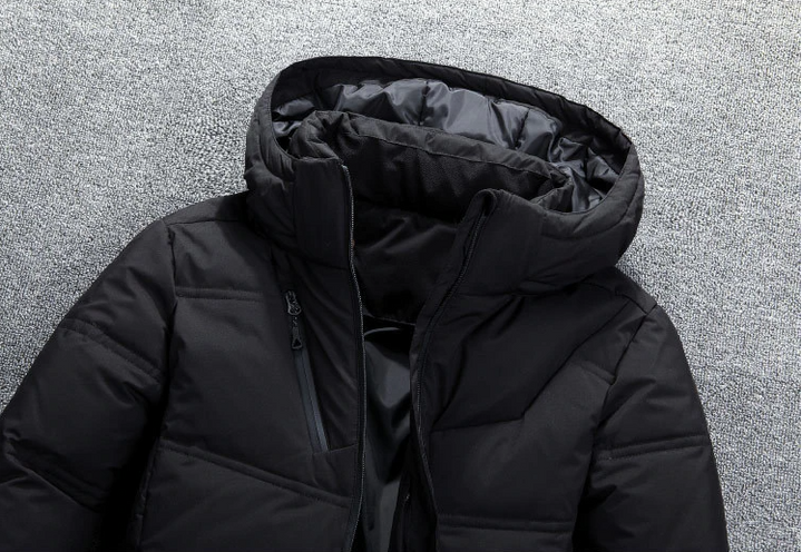 Hudson black winter jacket hood and collar detail, close-up