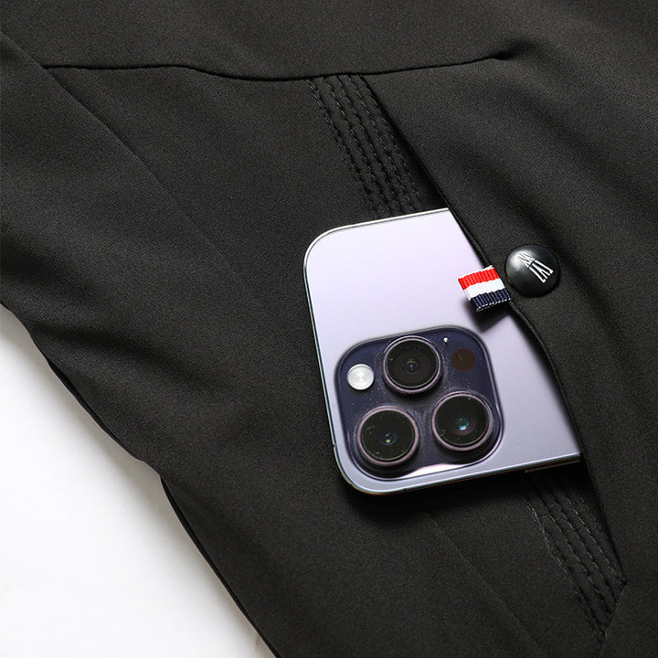 Close-up of zipper pocket and drawcord detail on Dashiell winter jacket