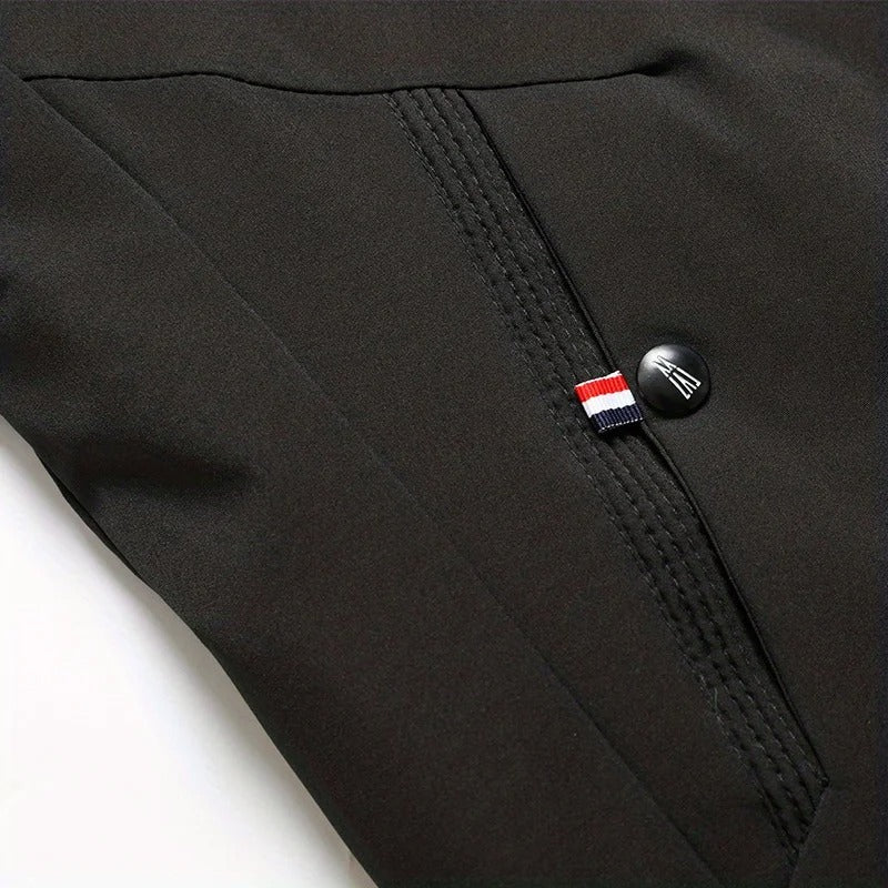 Close-up of zipper pocket and drawcord detail on Dashiell winter jacket