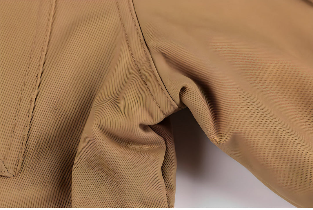 Barrett tan tactical winter jacket, back view showing hood and silhouette