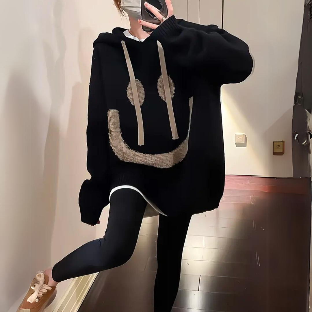 Ophelia oversized smiley print hoodie in black, front view