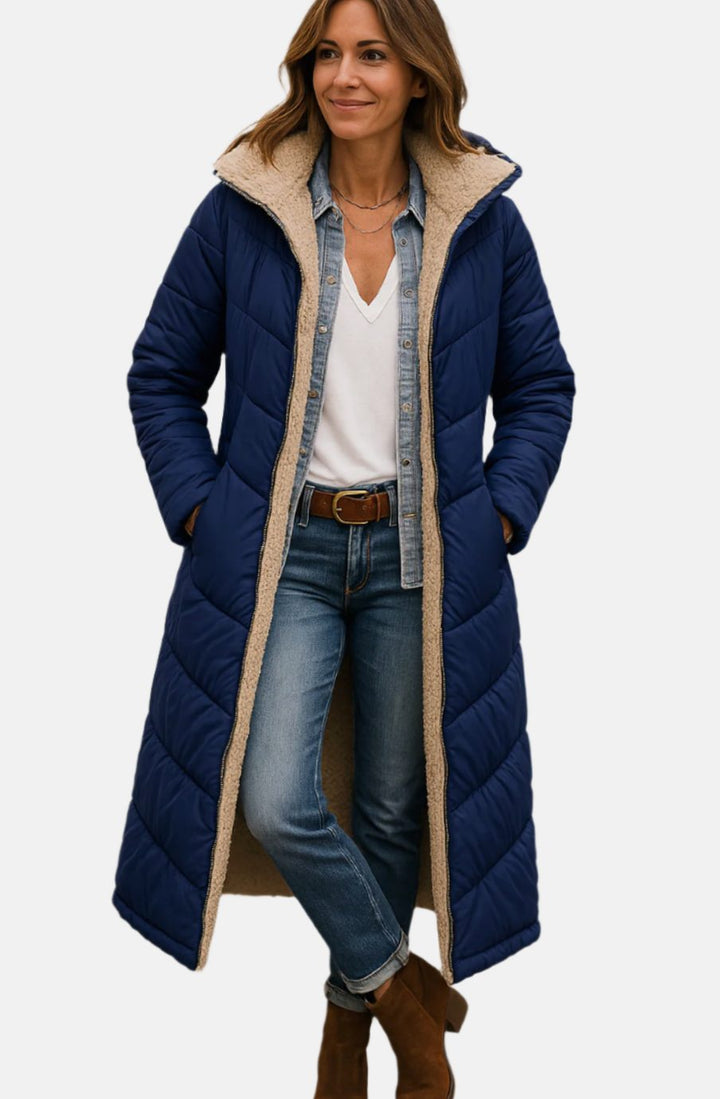 Rosalind long hooded sherpa jacket in navy blue, front view with hands in pockets