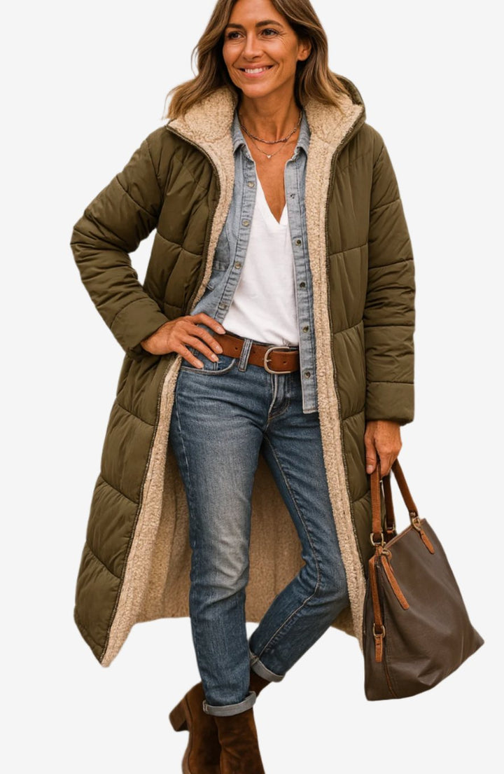 Rosalind long hooded sherpa jacket in army green, front view with hand on hip