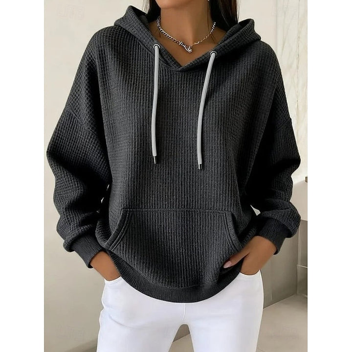 Sabrina textured drawstring hoodie in black, front view