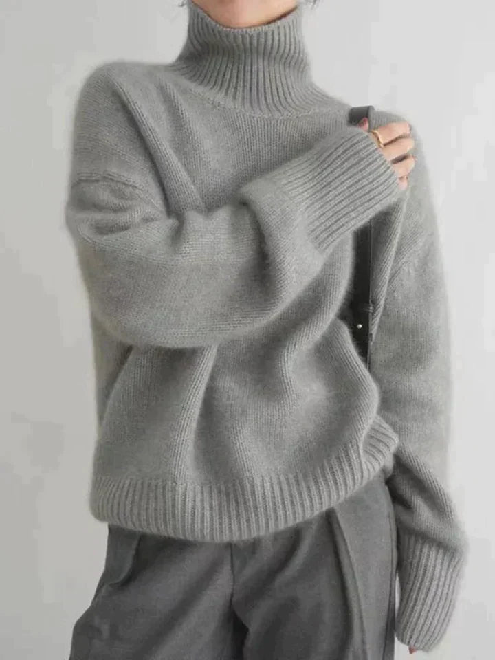 Seraphina oversized gray turtleneck sweater, close-up detail view