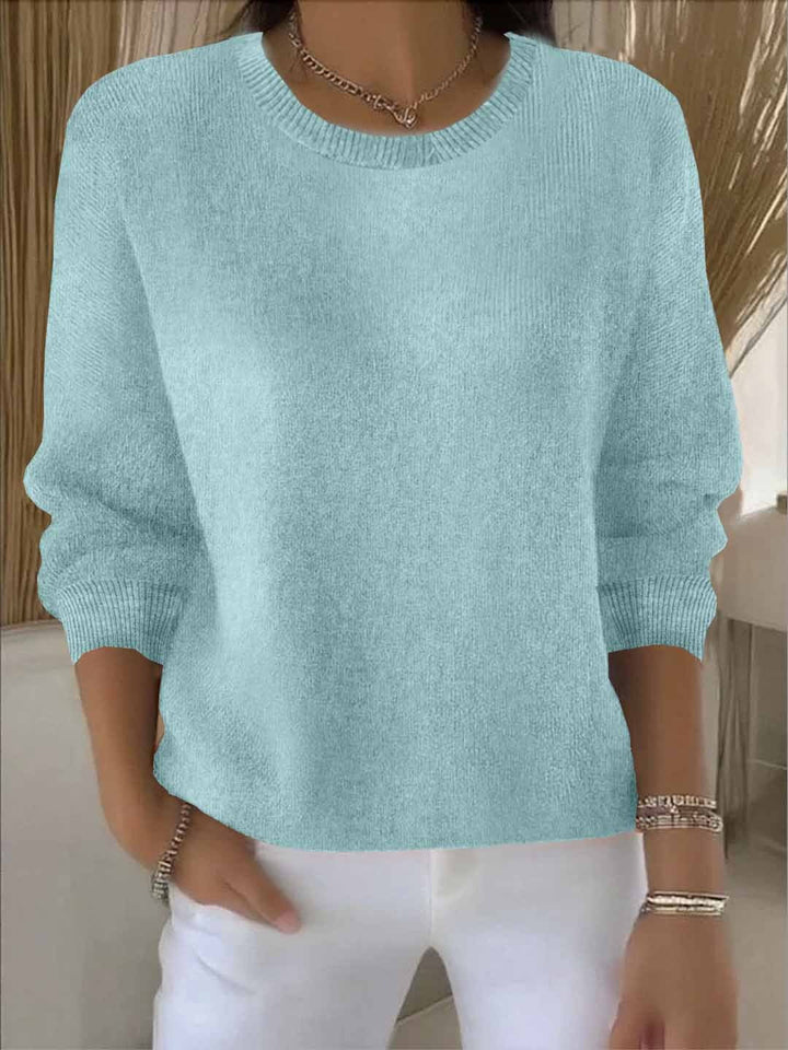 Verity relaxed crew neck sweater in light green, front view