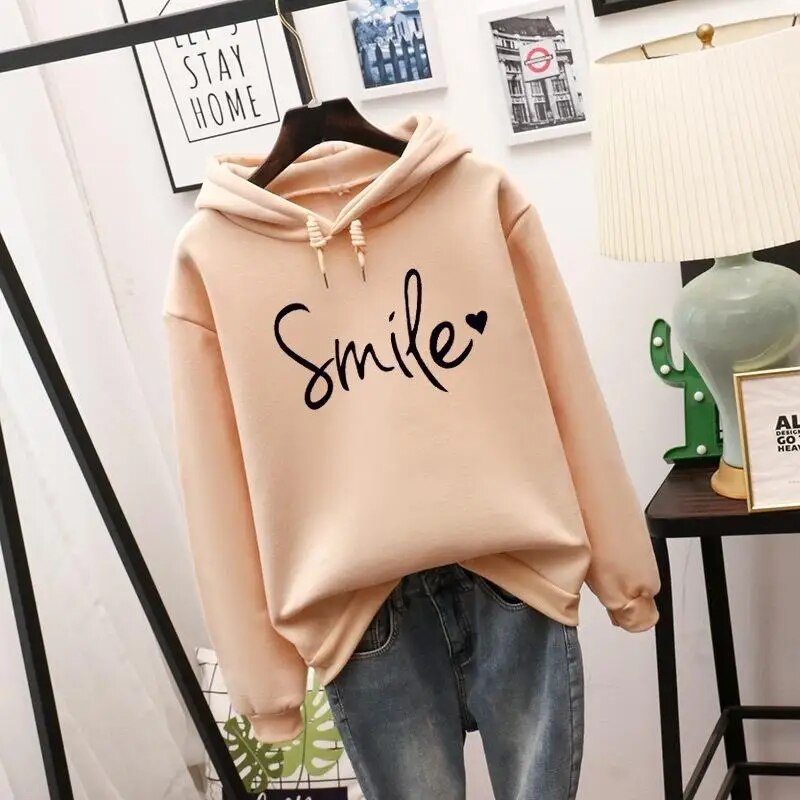 Willa oversized graphic print hoodie in beige, front view on hanger