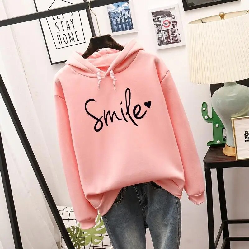 Willa oversized graphic print hoodie in pink, front view on hanger