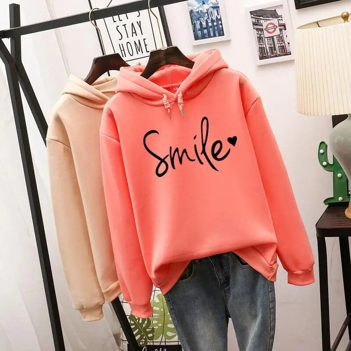 Willa oversized graphic print hoodie in orange, front view with color options