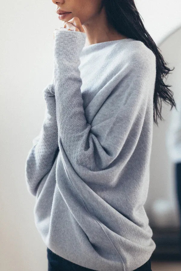 Isolde draped boat neck sweater in gray, side view close-up