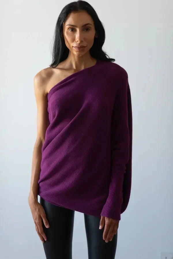 Isolde draped boat neck sweater in green, off-shoulder front view